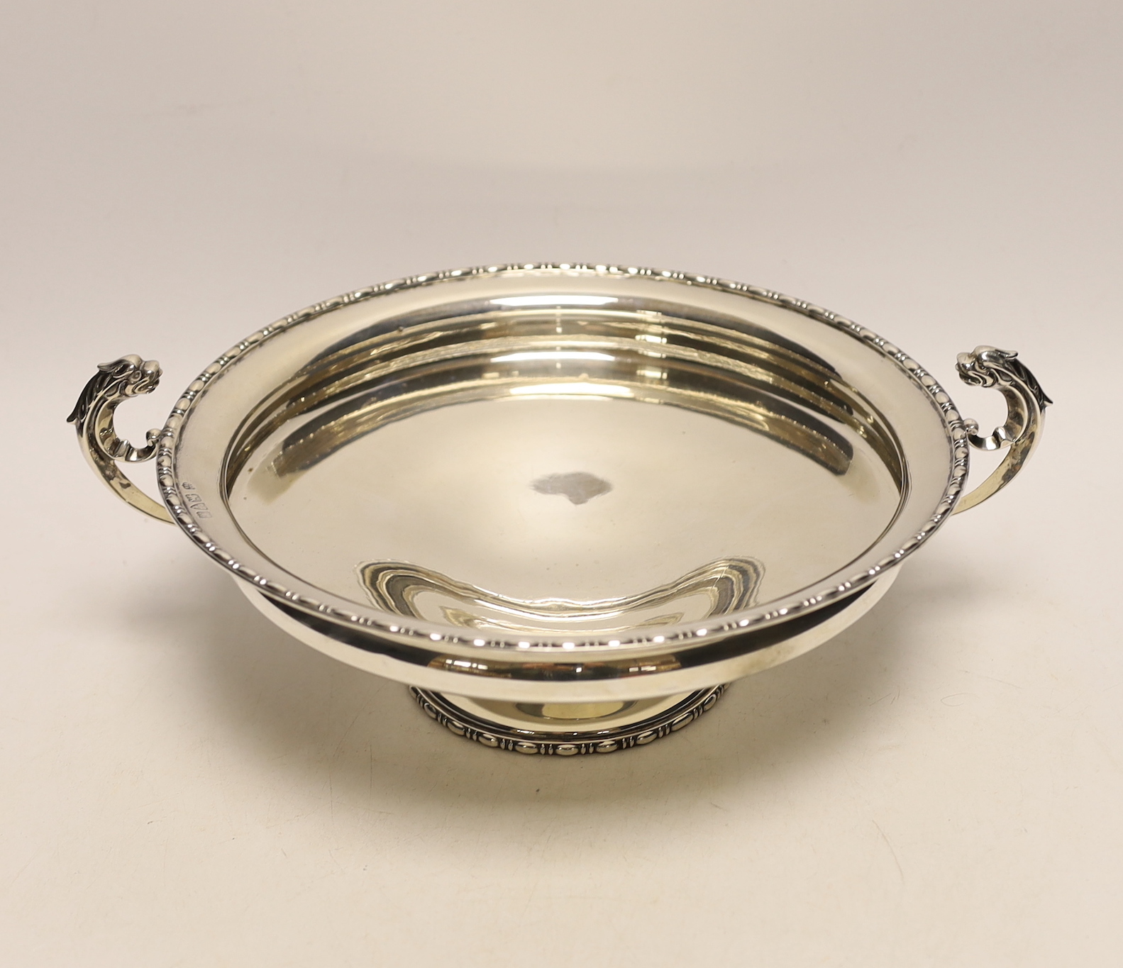 A George V twin handled silver tazza, Barker Brothers, Chester, 1923, diameter 24.8cm, 19.3oz.